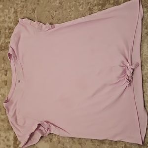 A pink size small in kids shirt from So